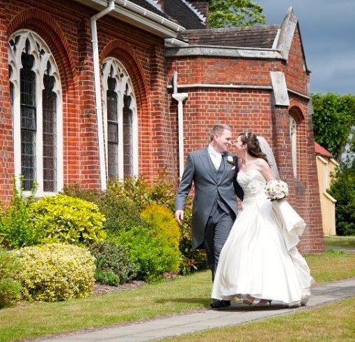 A newly married couple outside St Barnabas church