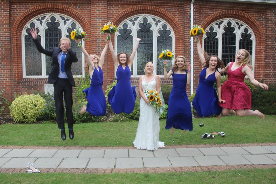 A wedding party outside St Barnabas church